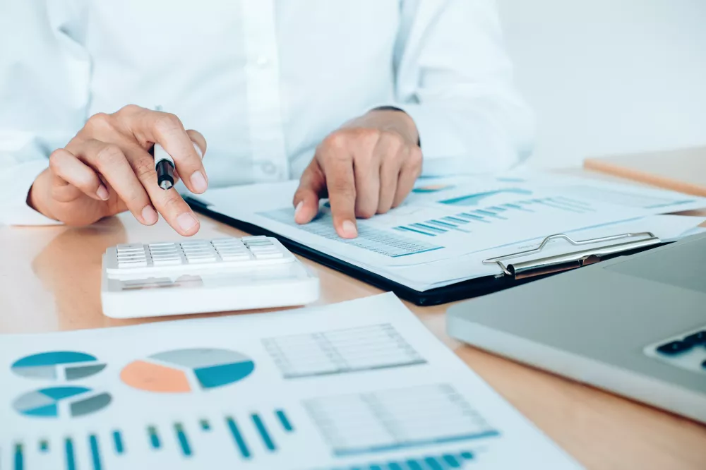 finances-saveing-economy-concept-female-accountant-banker-use-calculator